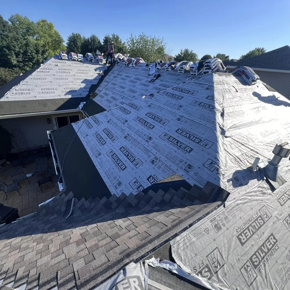 Slide of Family Construction Roofing