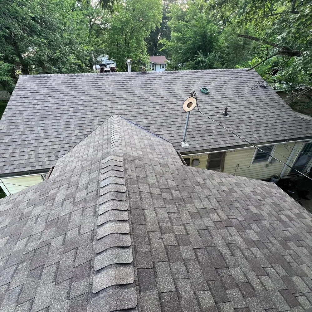 Slide of Family Construction Roofing