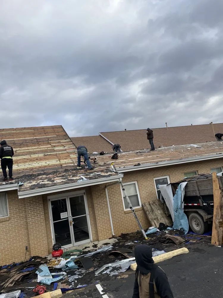 Slide of Family Tree Roofing