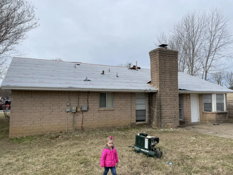 Slide of Family Tree Roofing