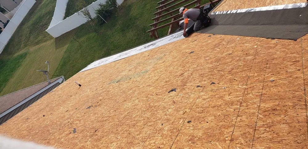 Slide of Famous Roofing & Solutions