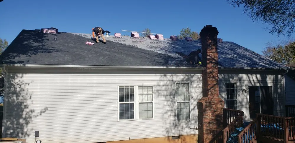 Slide of Famous Roofing & Solutions