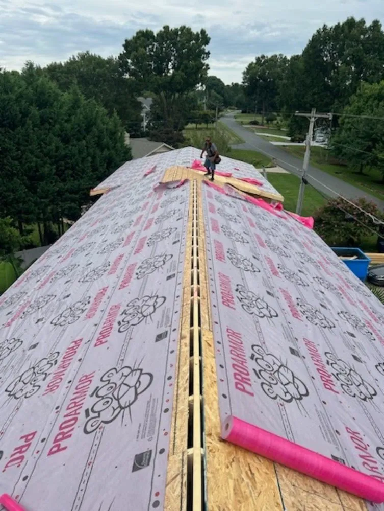 Slide of Famous Roofing & Solutions