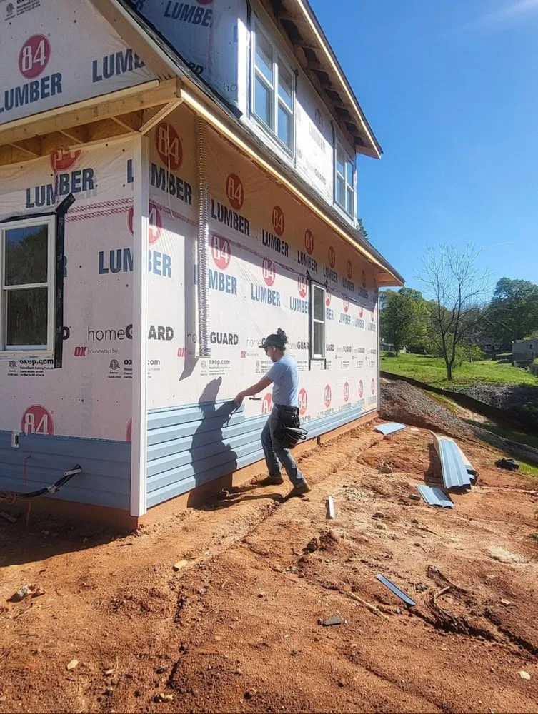 Slide of Famous Roofing & Solutions