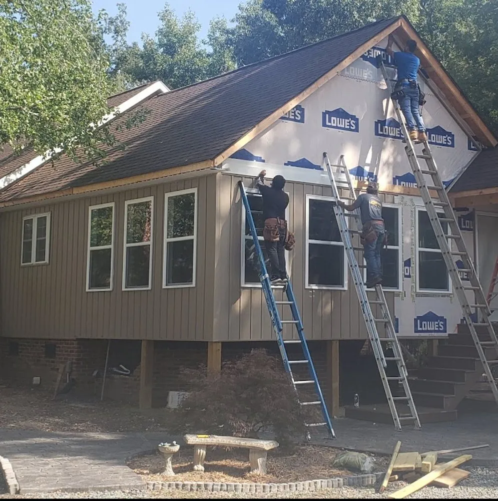 Slide of Famous Roofing & Solutions