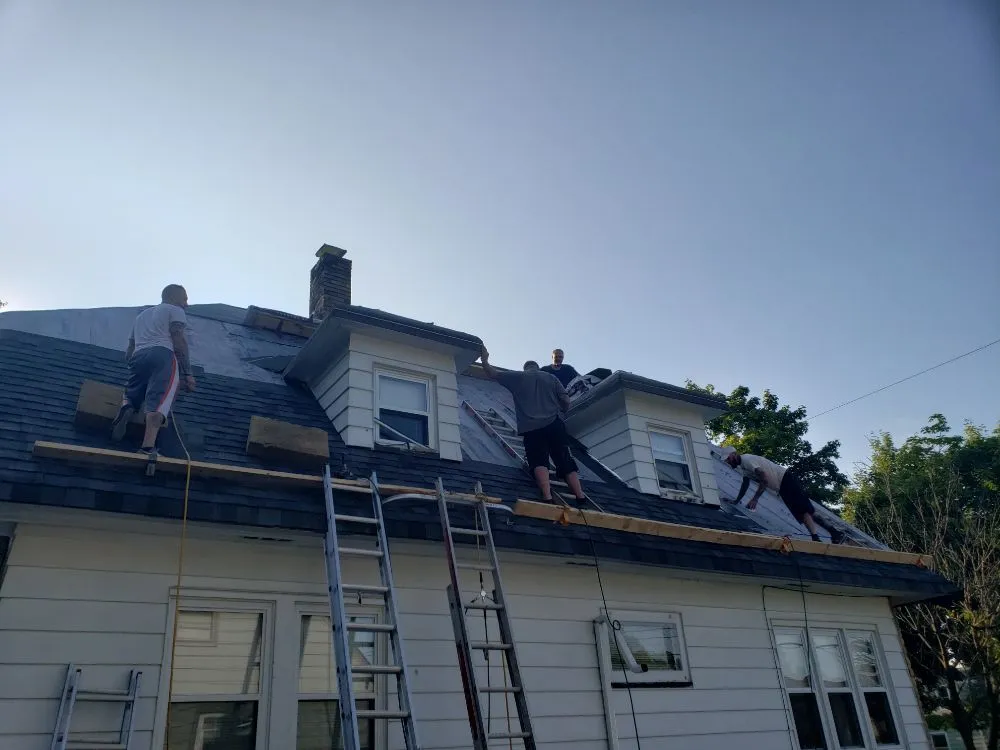 Slide of Far More Roofing and Construction
