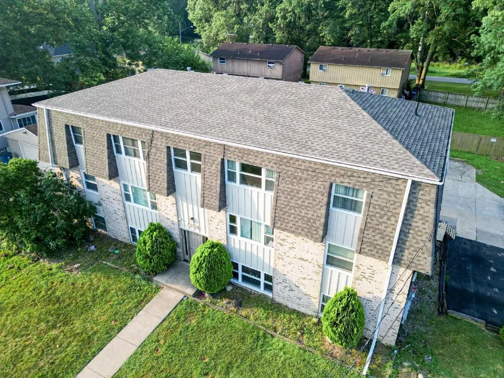 Slide of Farley's Roofing