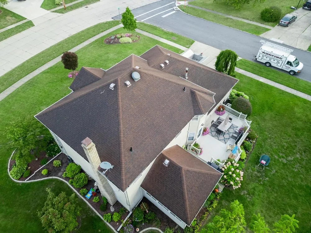 Slide of Farley's Roofing