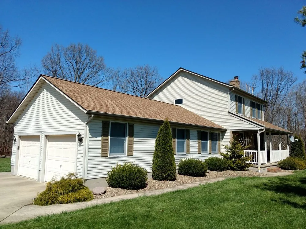 Slide of Farley's Roofing
