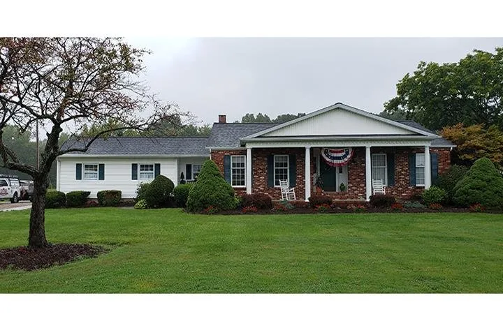 Slide of Farley's Roofing