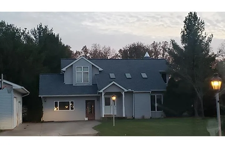 Slide of Farley's Roofing
