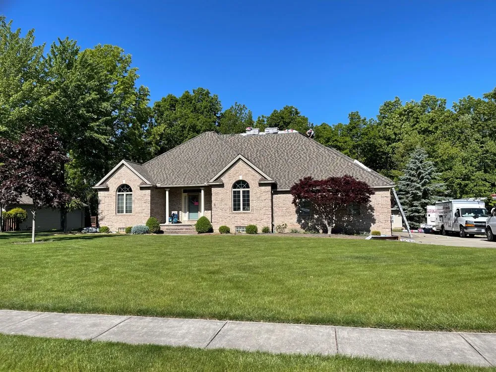 Slide of Farley's Roofing