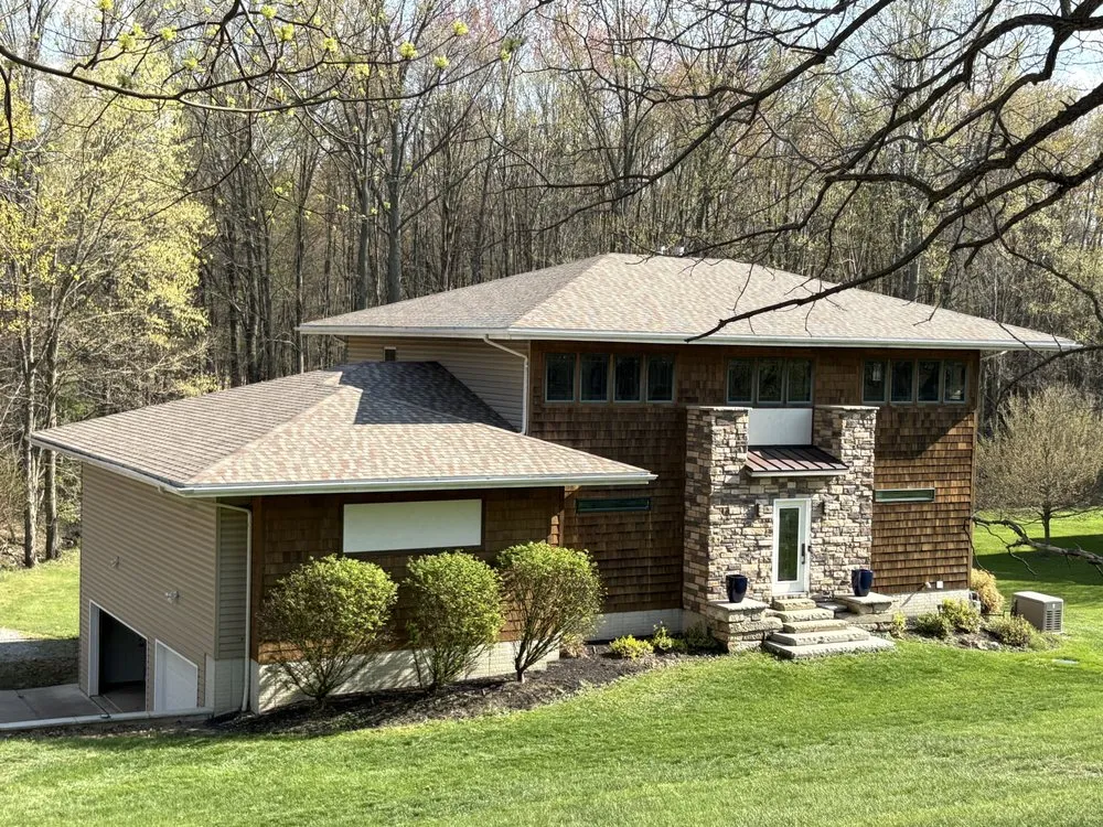 Slide of Farley's Roofing