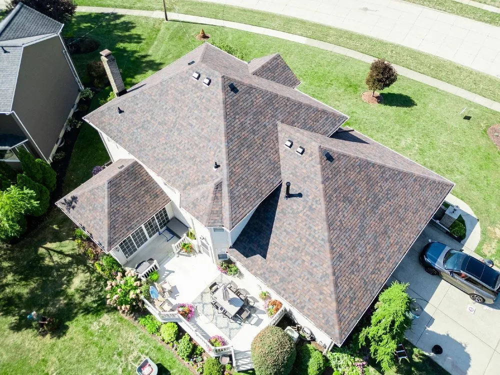 Slide of Farley's Roofing