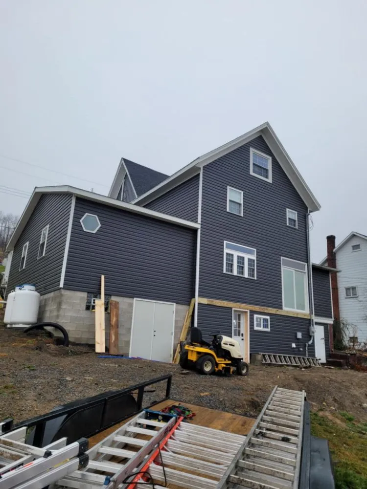 Emergency roof replacement after storm damage in Cairnbrook, PA by Fast Track Construction