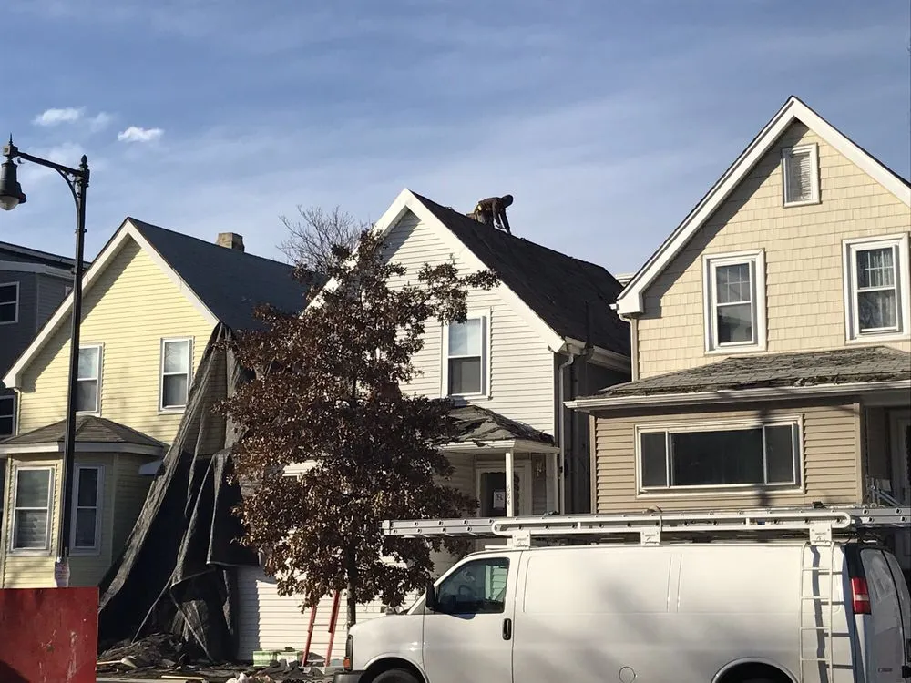 Slide of Father and Son Home Improvements