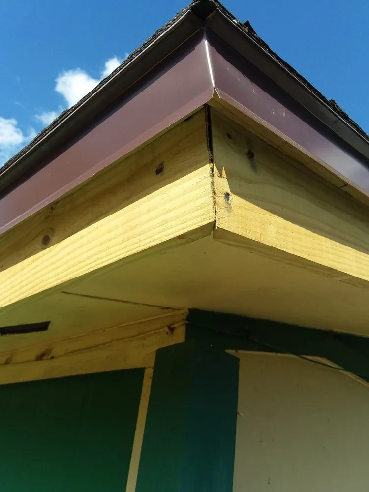 Slide of Father and Son Roofing