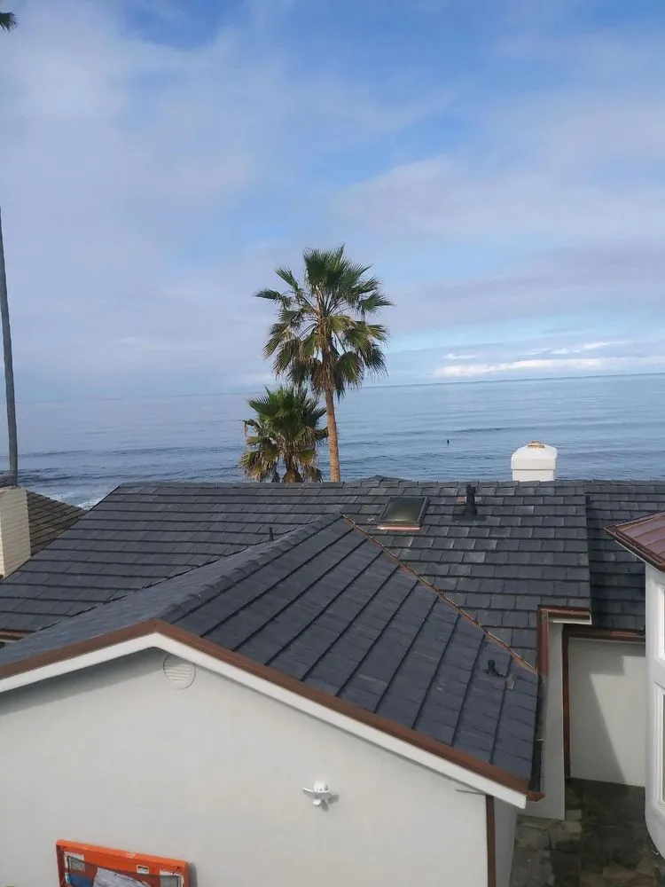 Slide of Father And Son Roofing.