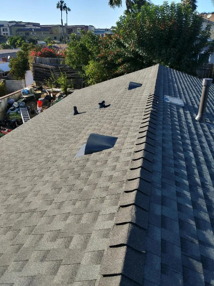 Slide of Father And Son Roofing.