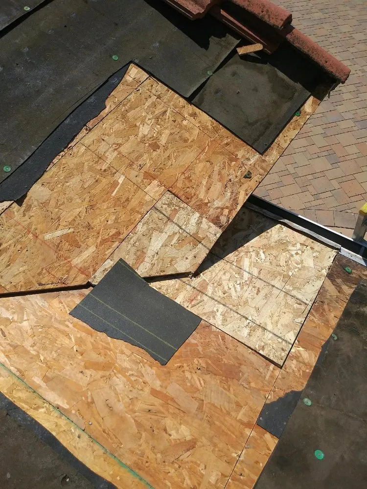 Slide of Father And Son Roofing.