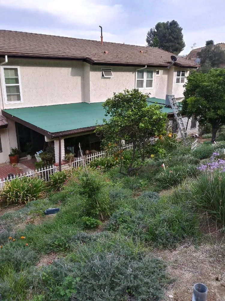 Slide of Father And Son Roofing.