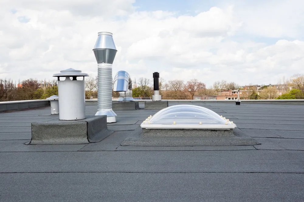 Licensed flat roof repair in Basking Ridge, NJ by Father Sons Construction