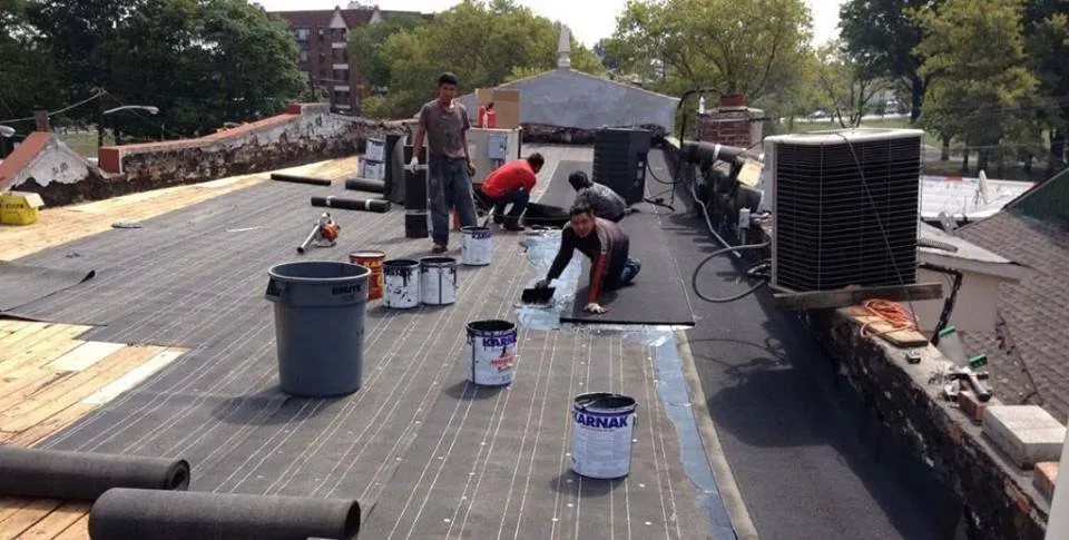Emergency storm damage roof repair in Basking Ridge, NJ by Father Sons Construction