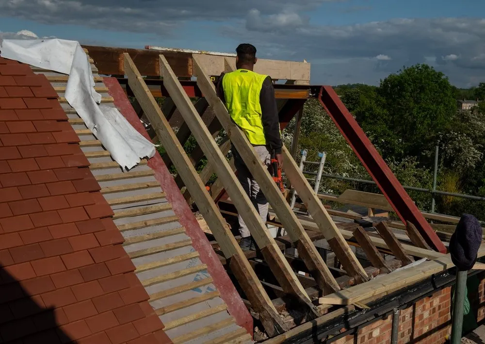 Slide of Faver Roofing