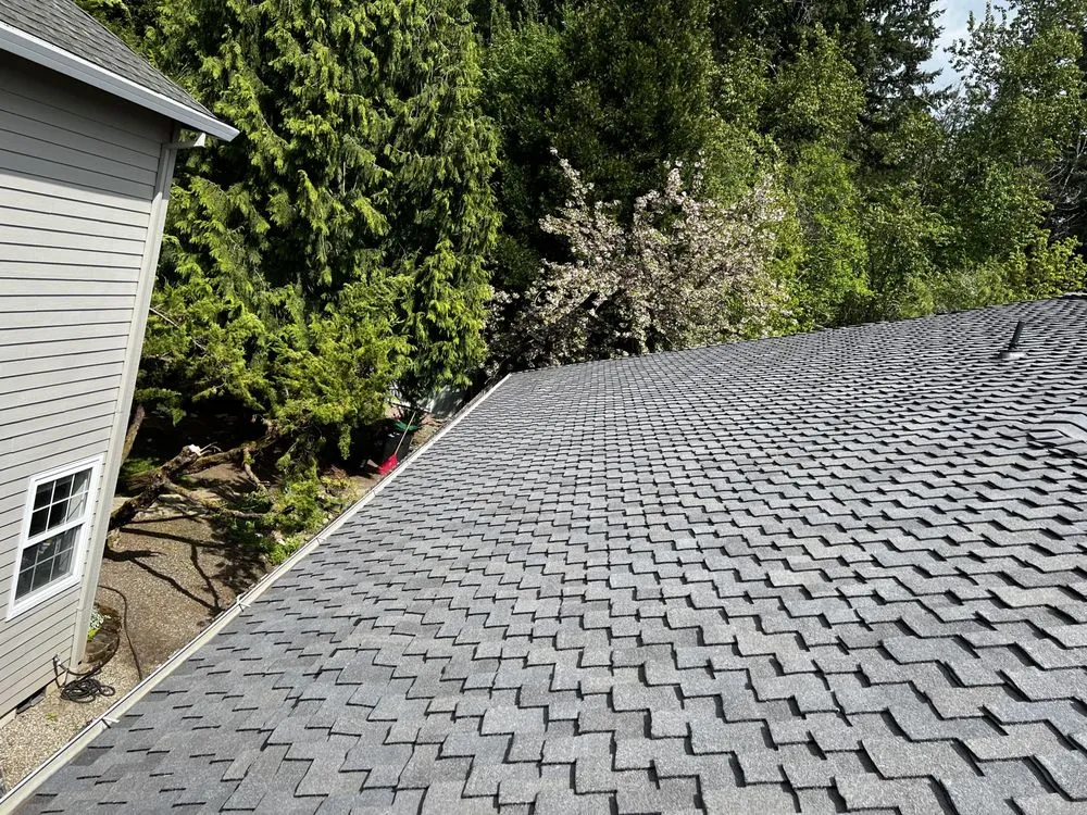 Professional storm damage roof repair in Hillsborro, OR by Fearless Tiger Construction