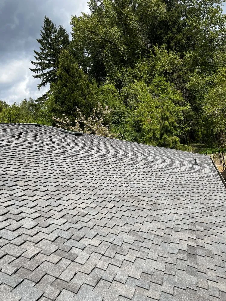 Professional residential roofing service after storm damage in Hillsborro, OR by Fearless Tiger Construction