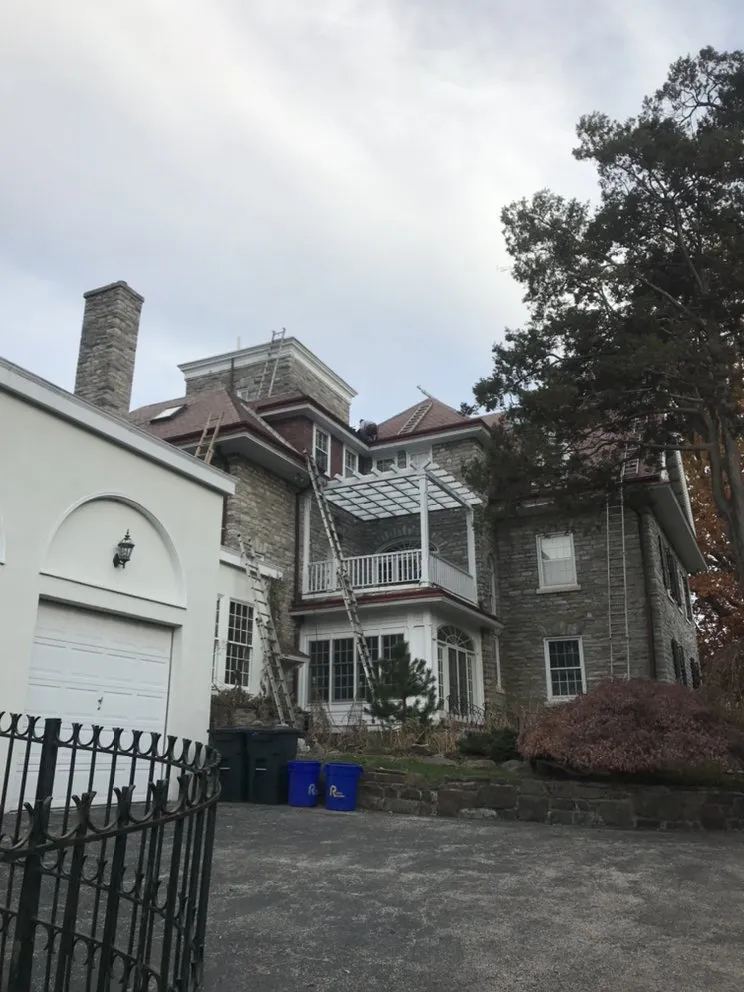 Slide of Feathers Roofing