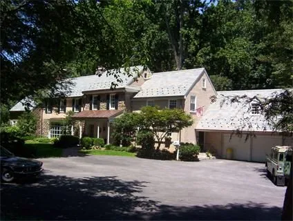 Slide of Feathers Roofing