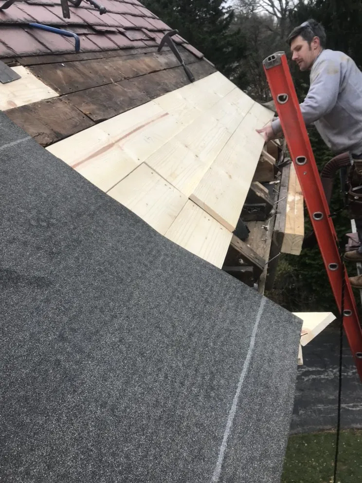 Slide of Feathers Roofing