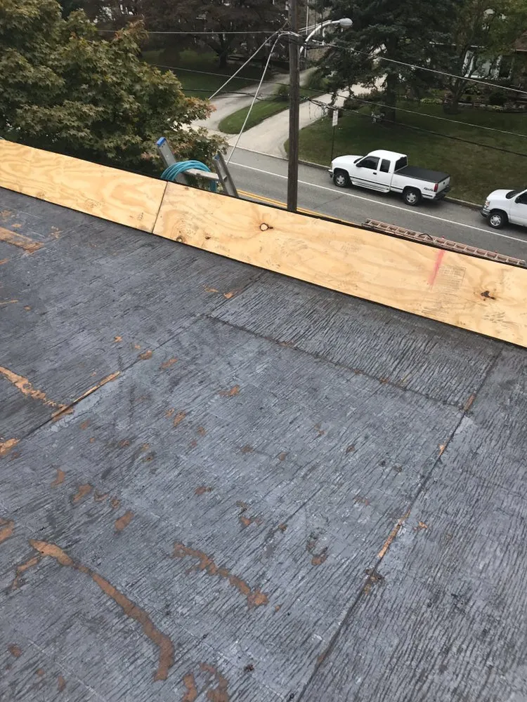 Slide of Feathers Roofing