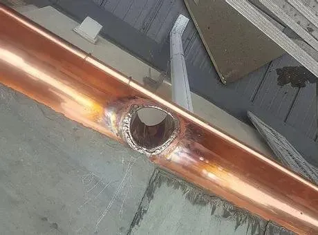 Slide of Feathers Roofing