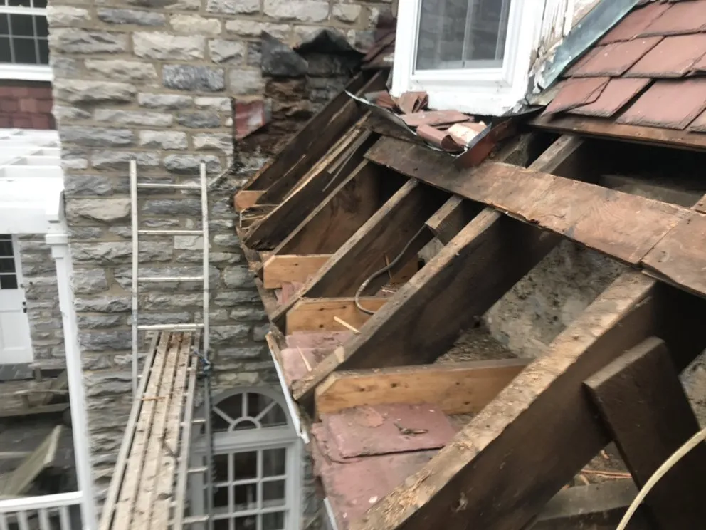 Slide of Feathers Roofing