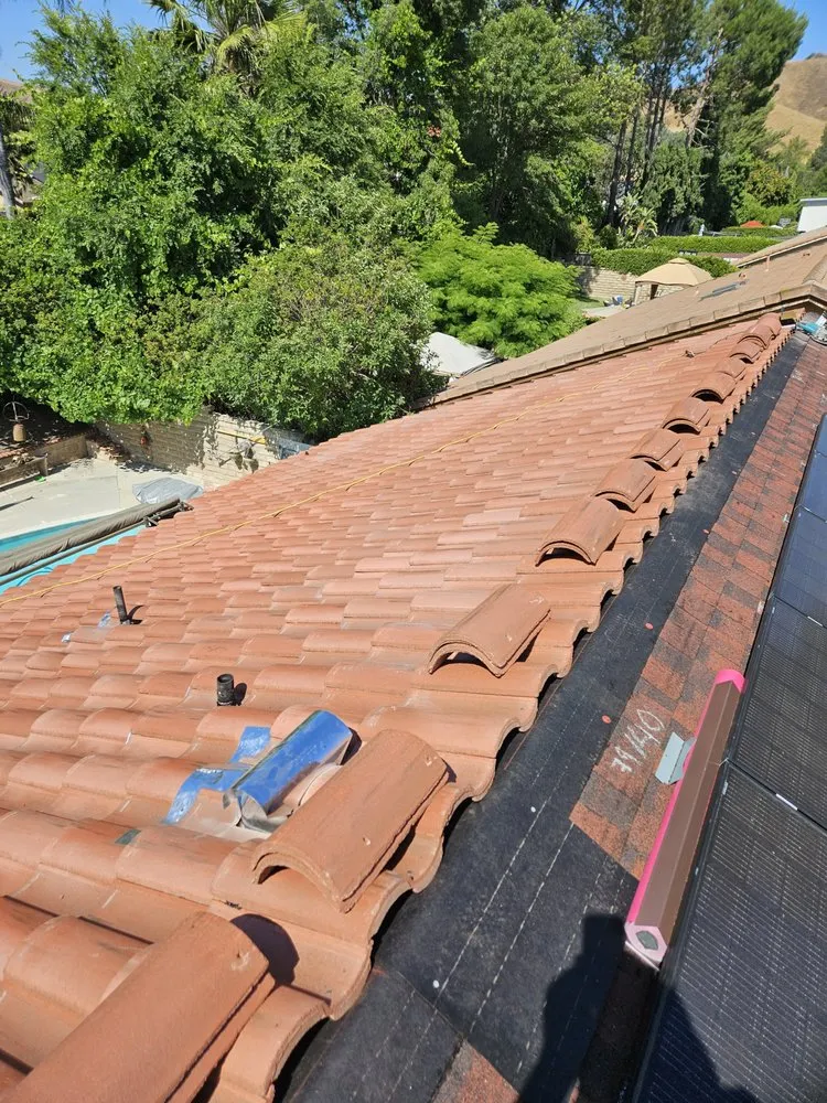 Slide of Femat Roofing