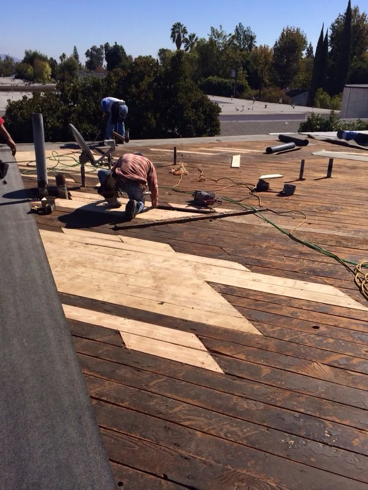 Slide of Ferguson & Melvin Roofing Contractor