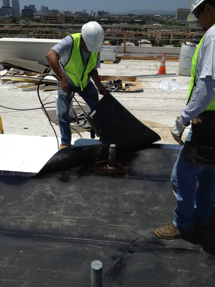 Slide of Ferguson & Melvin Roofing Contractor