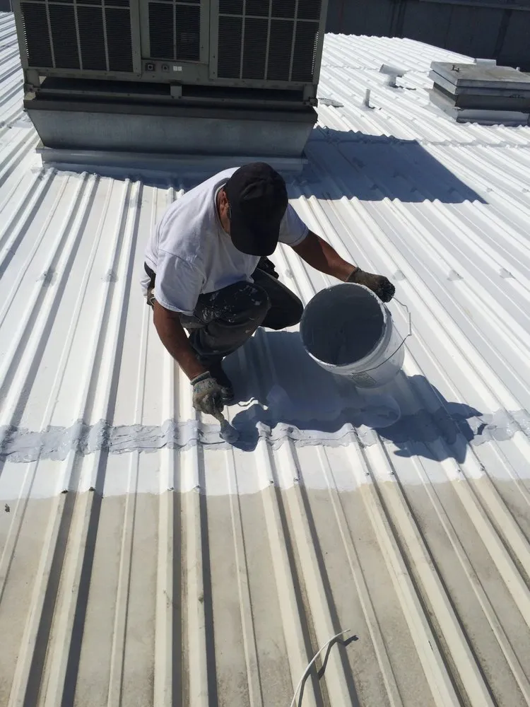 Slide of Ferguson & Melvin Roofing Contractor