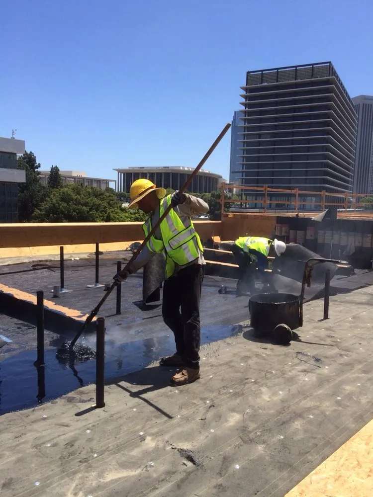 Slide of Ferguson & Melvin Roofing Contractor