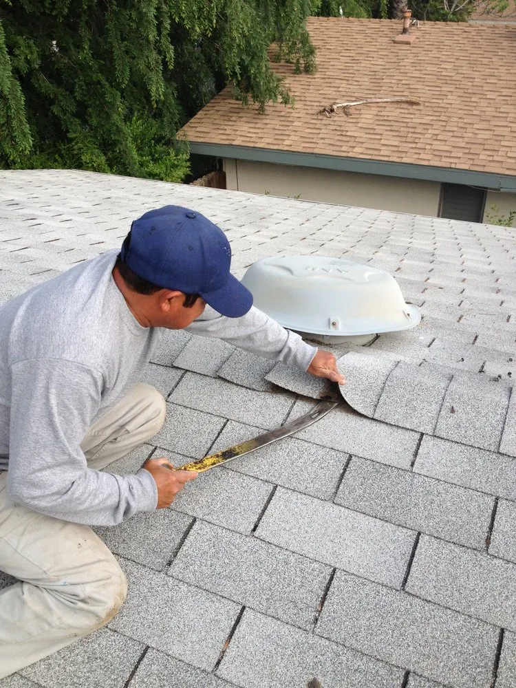 Slide of Ferguson & Melvin Roofing Contractor