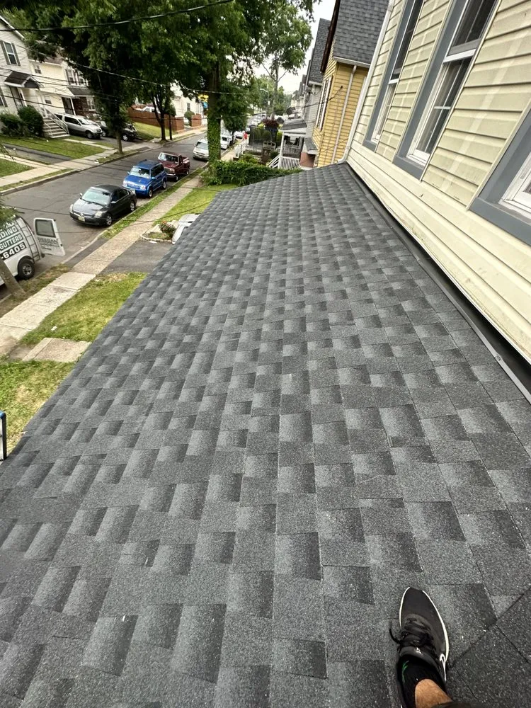 Slide of Fermin Roofing