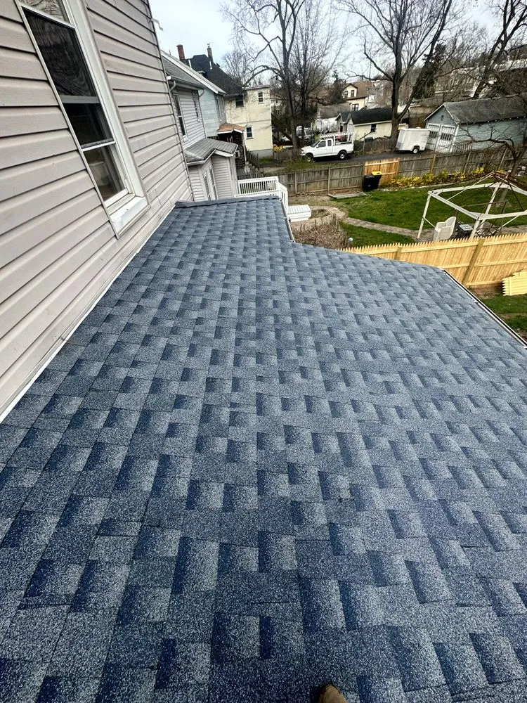 Slide of Fermin Roofing