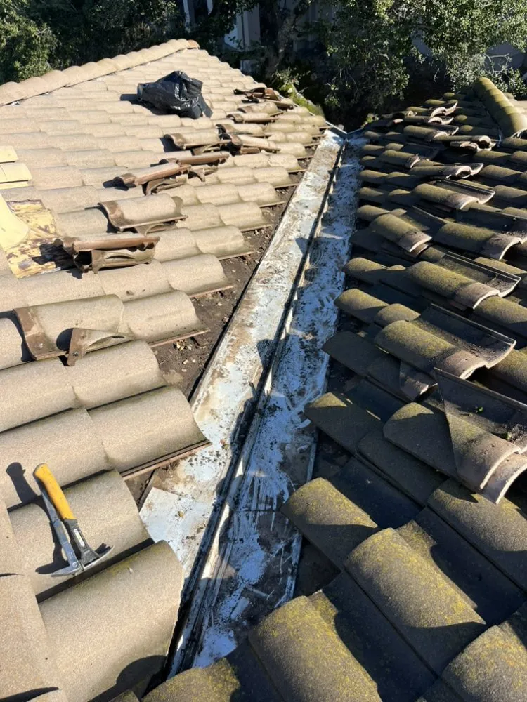 Slide of Fernandez Roof Repairs
