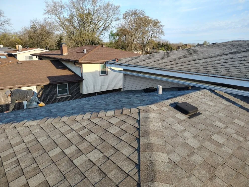 Slide of Fernandez Roofing & Gutters