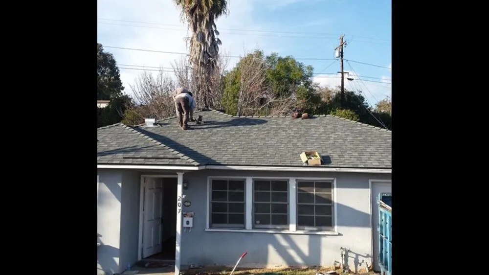 Slide of Fernandez Roofing