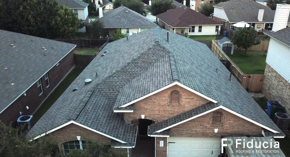 Slide of Fiducia Roofing & Restoration