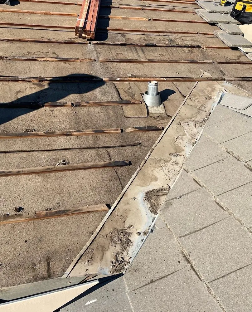 Slide of Fili's Roofing