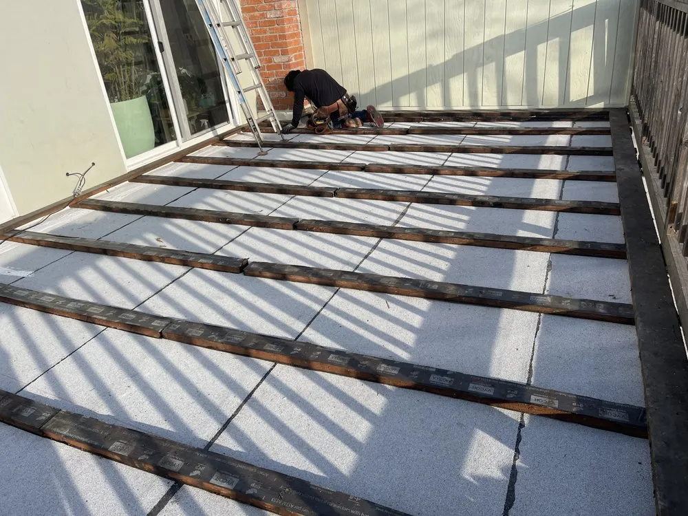 Slide of Fili's Roofing